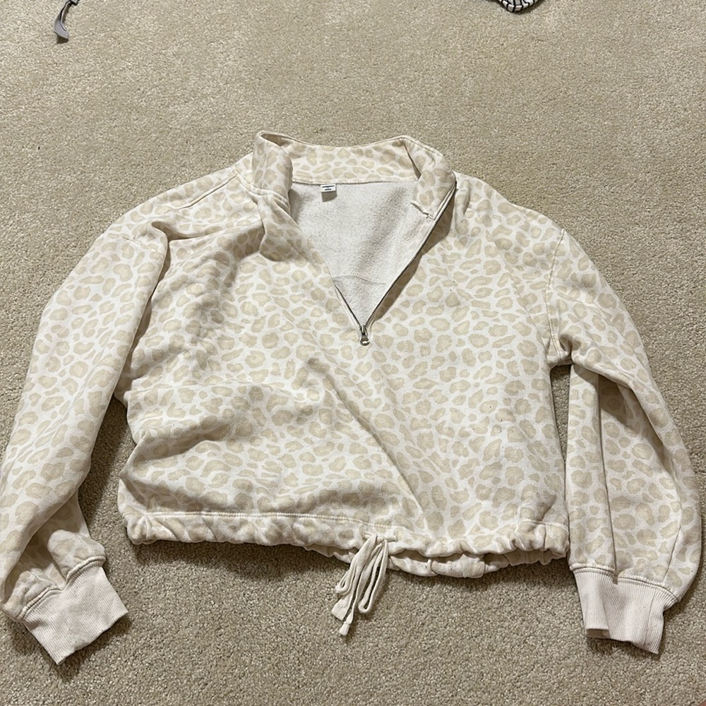 Cropped quarter zip. Soft inside.